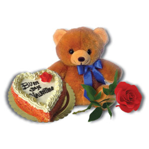 orsacchiotto torta a forma di cuore con la scritta Buon San Valentino e una rosa rossa