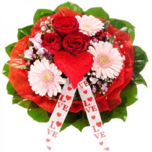 Bouquet con rose rosse e gerbere rosa